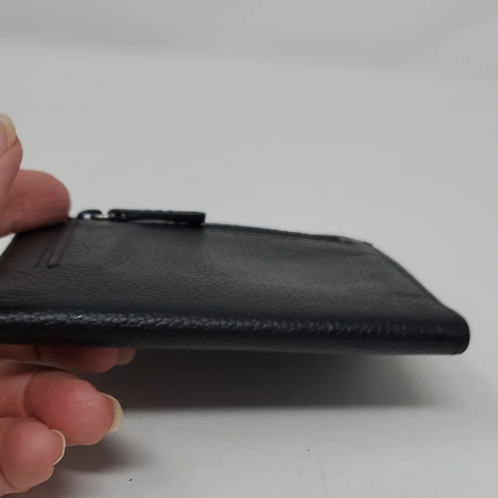 Black Leather Tri-fold Wallet With Cross Embrossed On Front
